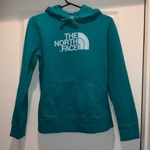 The North Face brand teal sweatshirt